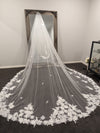 "Full-length view of the INEZ two-tier cathedral veil, showcasing its cascading 3D floral design."