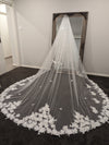 "Side profile of the INEZ wedding veil highlighting the elegant Venice lace and floral appliqués."