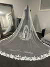 Cathedral bridal veil draped over altar with custom name detail