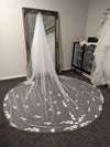 Close-up of the SAMANTHA drop-style veil showcasing intricate 3D flower designs with pearl accents on delicate tulle.