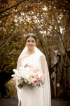 Image of a pearl wedding veil with delicate pearl accents