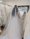 Image of a pearl wedding veil with delicate pearl accents
