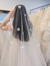 Image of a pearl wedding veil with delicate pearl accents