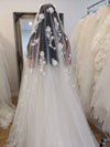 Image of a pearl wedding veil with delicate pearl accents and 3D florals