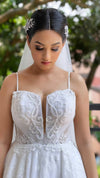 Silver bridal tiara with rhinestone detailing.