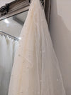 Image of a pearl wedding veil with delicate pearl accents