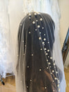 Image of a pearl wedding veil with delicate pearl accents