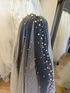 Image of a pearl wedding veil with delicate pearl accents