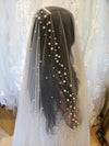 Image of a pearl wedding veil with delicate pearl accents