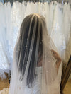 Image of a pearl wedding veil with delicate pearl accents