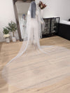 Image of a pearl wedding veil with delicate pearl accents