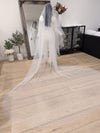 Image of a pearl wedding veil with delicate pearl accents