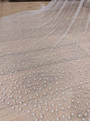 Image of a pearl wedding veil with delicate pearl accents