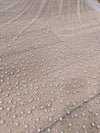 Image of a pearl wedding veil with delicate pearl accents