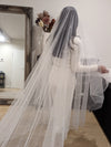 Image of a pearl wedding veil with delicate pearl accents