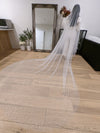 Image of a pearl wedding veil with delicate pearl accents