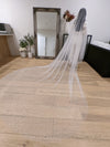 Image of a pearl wedding veil with delicate pearl accents