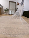 Image of a pearl wedding veil with delicate pearl accents