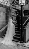 Side profile of the NADIA 3D floral wedding veil, highlighting its elegant drop-style silhouette.