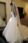 Image of a pearl wedding veil with delicate pearl accents